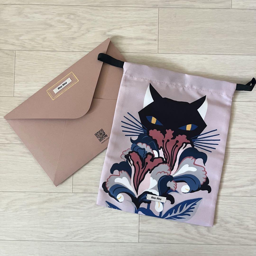 【未使用品】ミュウミュウ miumiu ノベルティ 巾着 ポーチ 黒猫 ネコ 女 5,295円