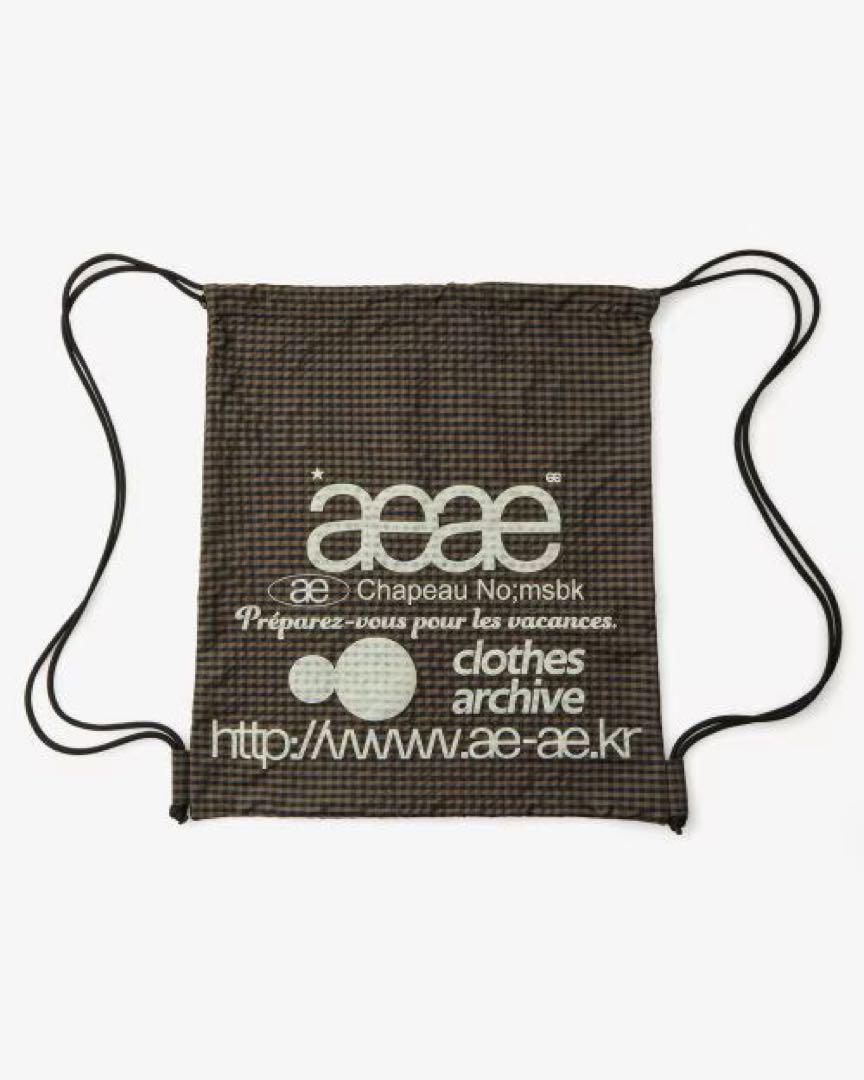 新品】aeae エーイーエーイー ナップサック チェック ブラウン