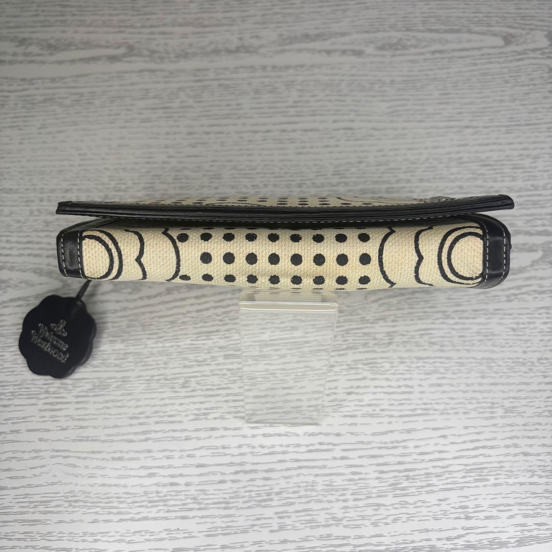 おトク情報がいっぱい！ 美品 ヴィヴィアンウエストウッド 財布 二つ折り S7722 小物 小物