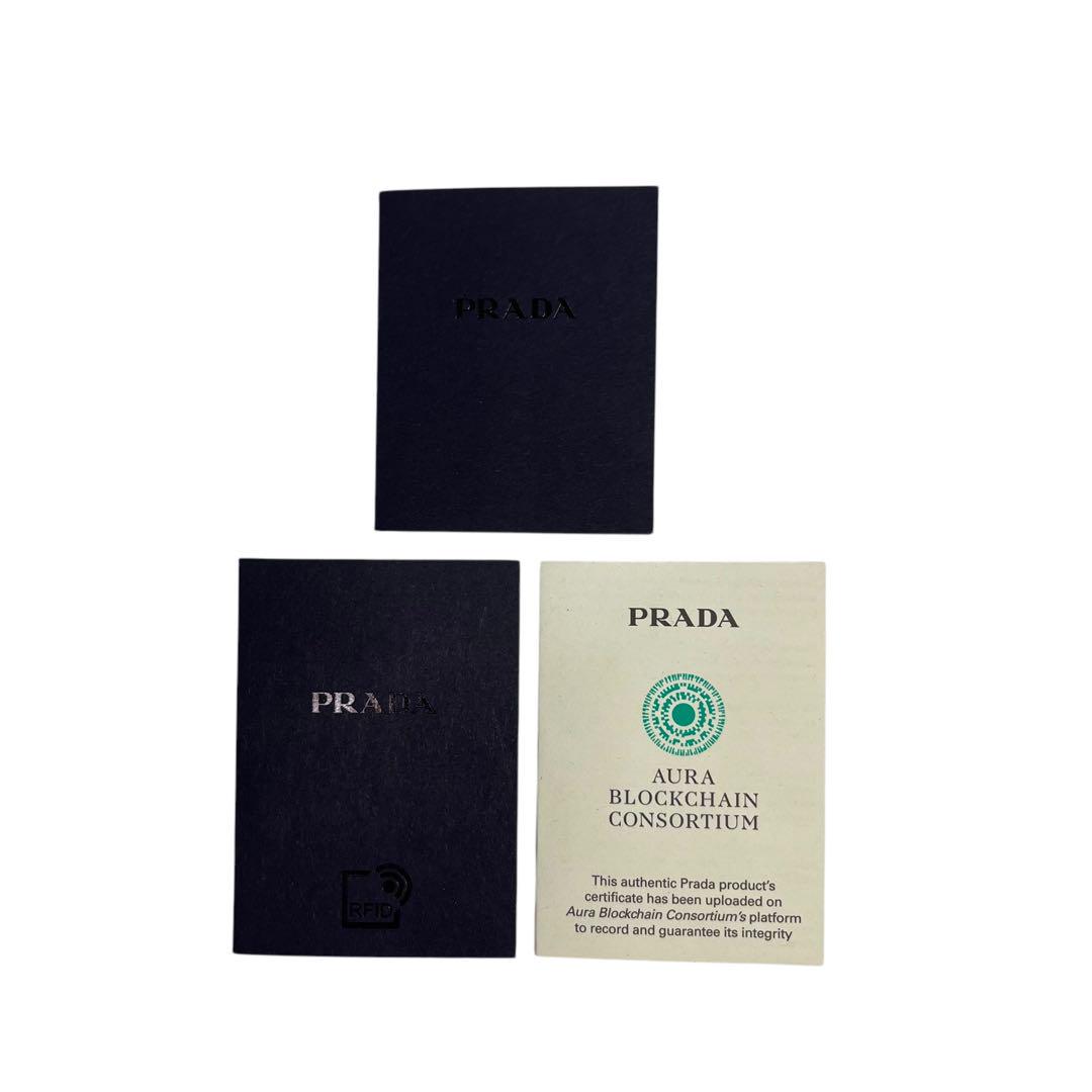 極美✨PRADA プラダ 二つ折り財布 サフィアーノレザー ロゴ金具 ホワイト