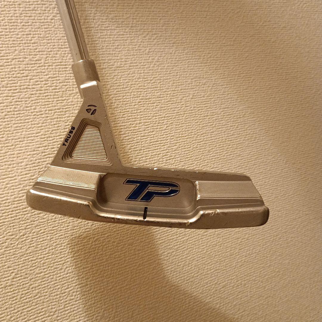 TB1