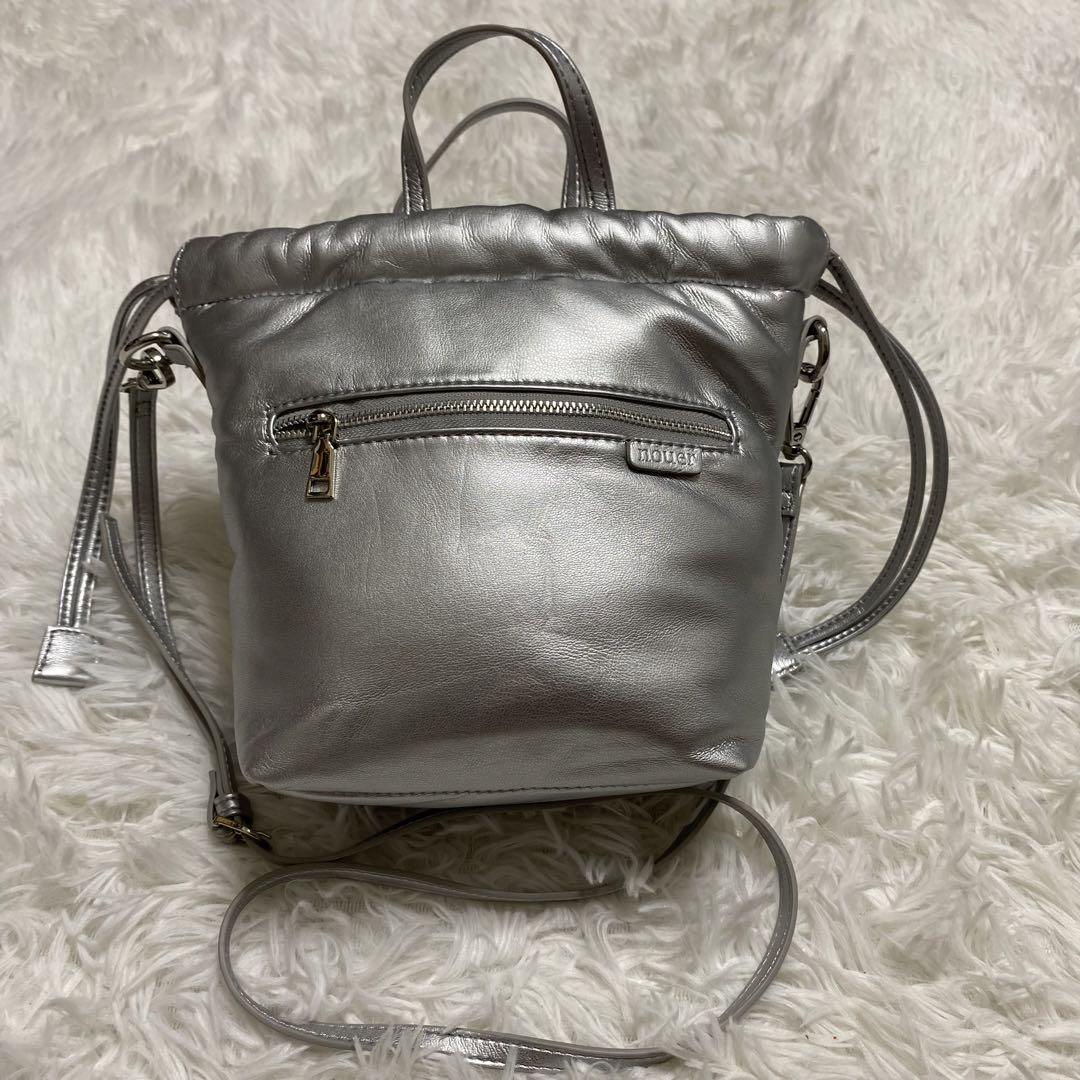 【極美品】nouer フェイスモチーフ巾着バッグ　シルバー