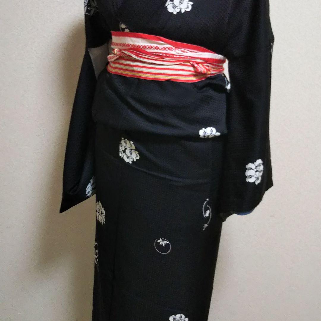 黒地に蘭の模様：小紋　御召