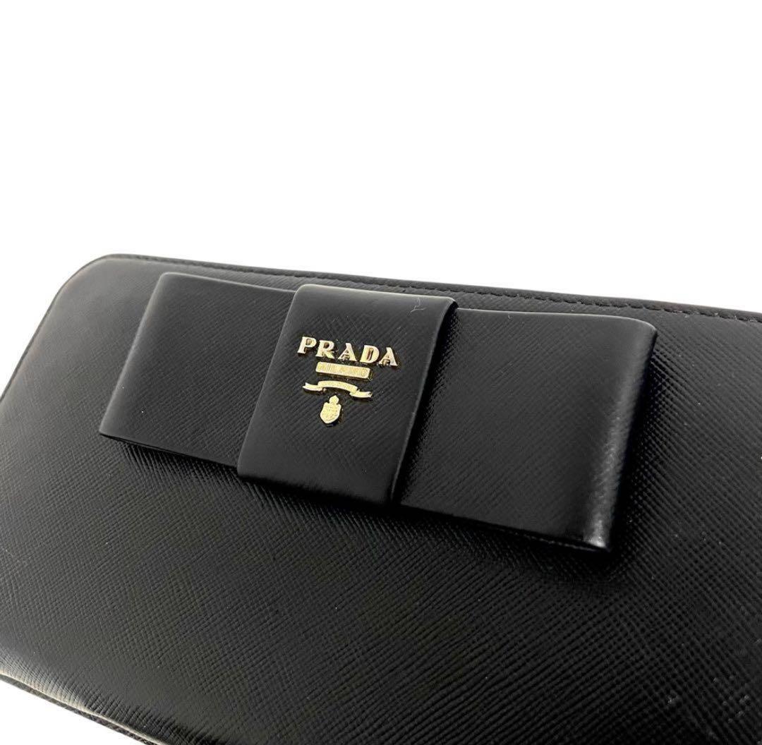 美品】プラダ PRADA ラウンドジップ サフィアーノ リボン 1ML506