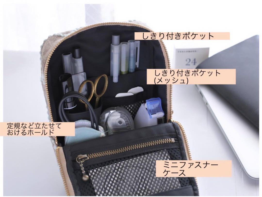 ミナペルホネン タンバリンのスタンドポーチ イエロー
