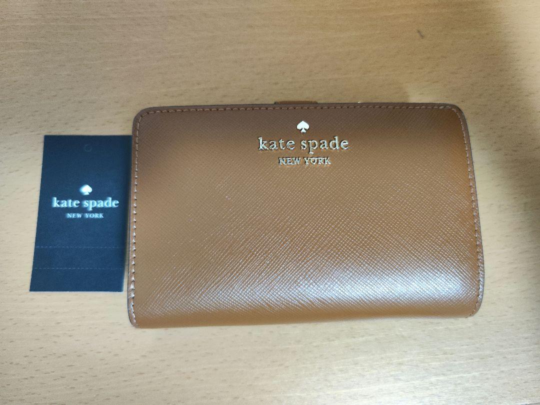 ️新品未使用】kate spade ブラウン 二つ折り財布 - メルカリ