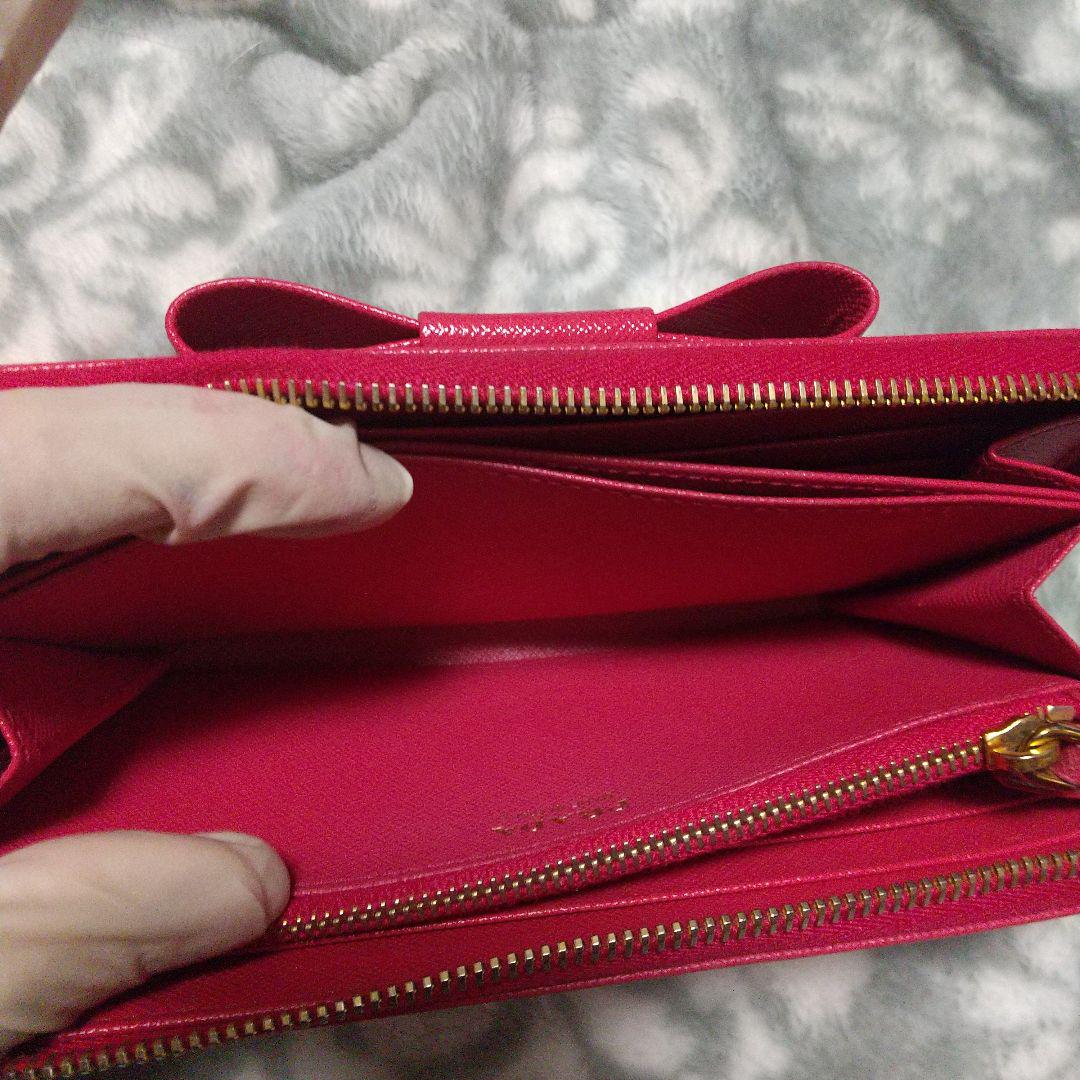 PRADA ラウンドファスナーリボン付き長財布 レッド