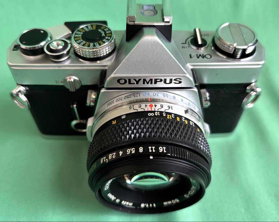 ★ OLYMPUS OM-1 (革ケース付)+ ★ 標準レンズ 50mm ☆ OLYMPUS OM-1 (革ケース付)+ ☆ 標準レンズ 50mm - メルカリ