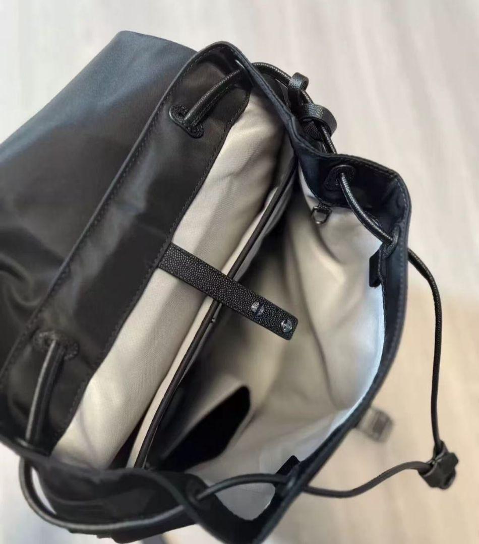 TUMI ・ レディースカジュアル巾着型 大容量リュックサック 旅行
