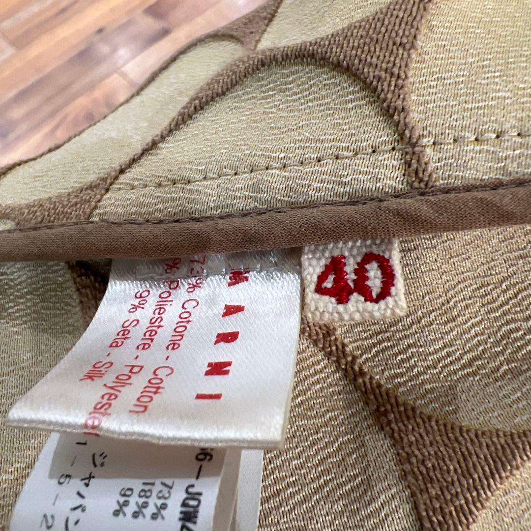 円形模様 コート