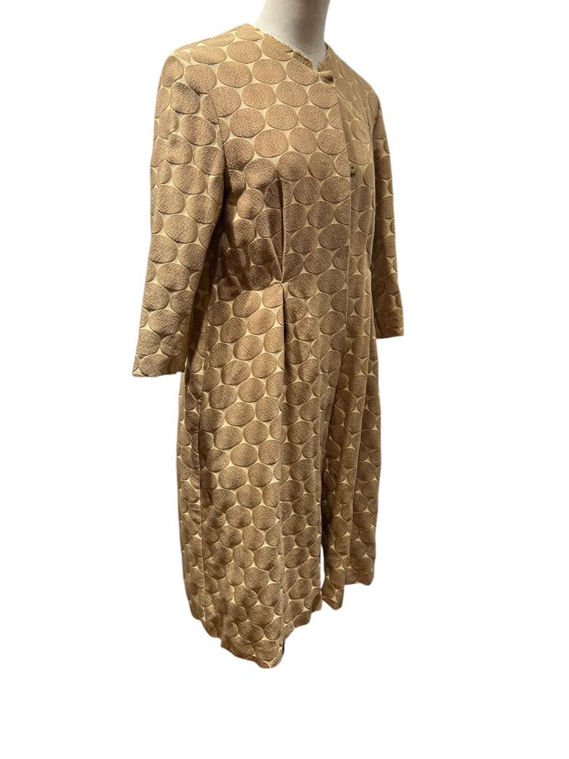 円形模様 コート