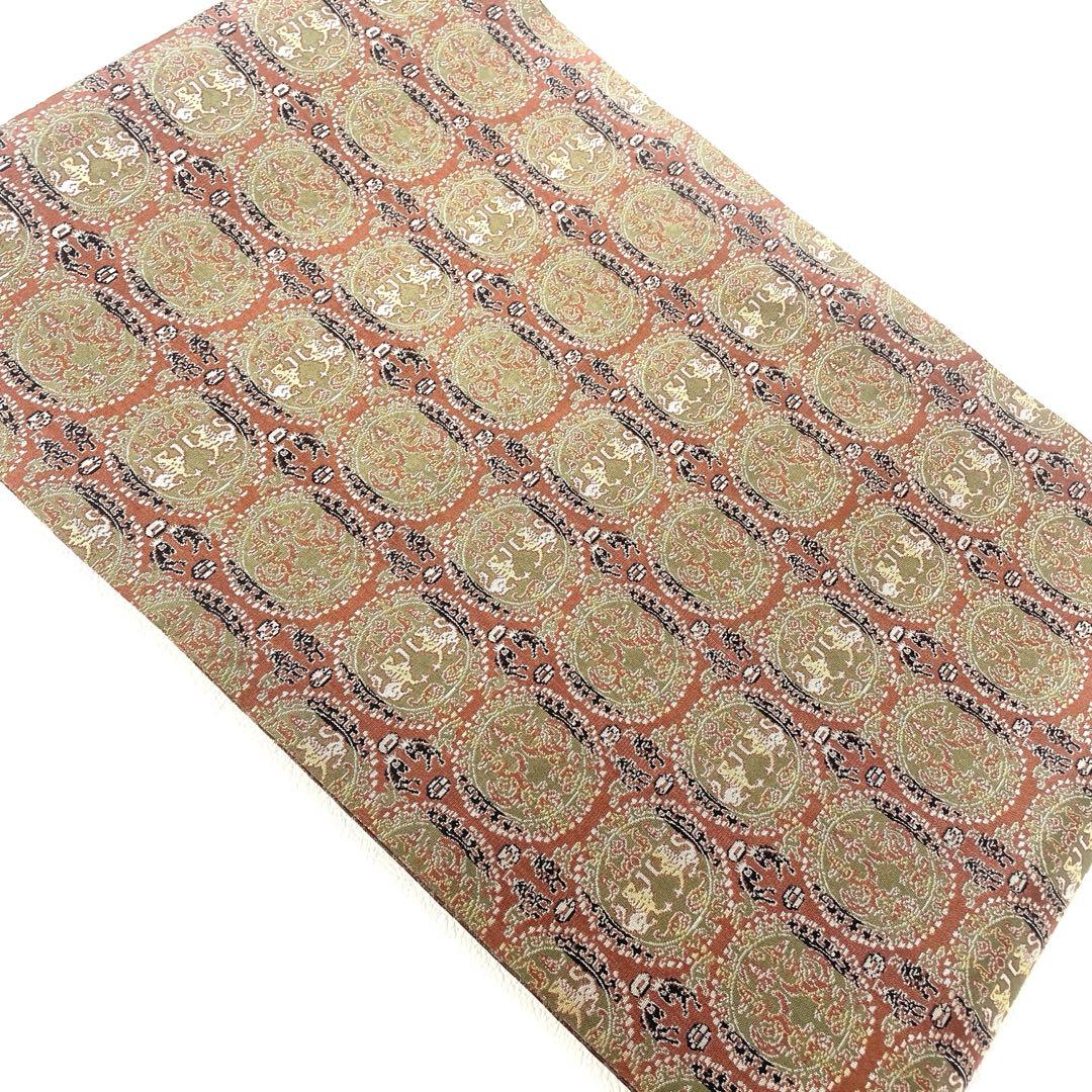 名古屋帯 円紋白虎朱雀錦目立った傷や汚れなし