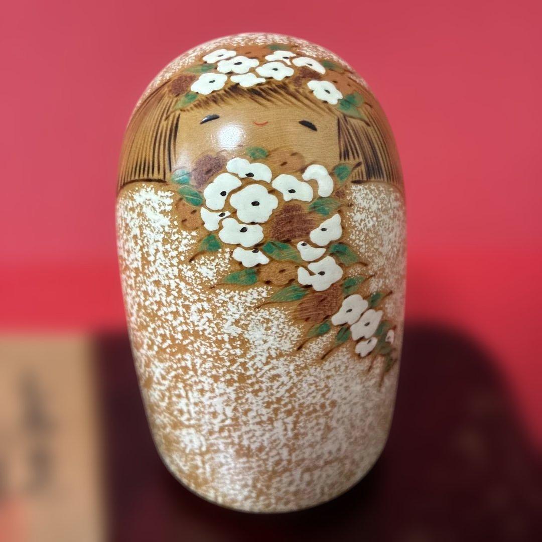 笑顔が幸せを呼ぶオルゴールの卯三郎こけし人形