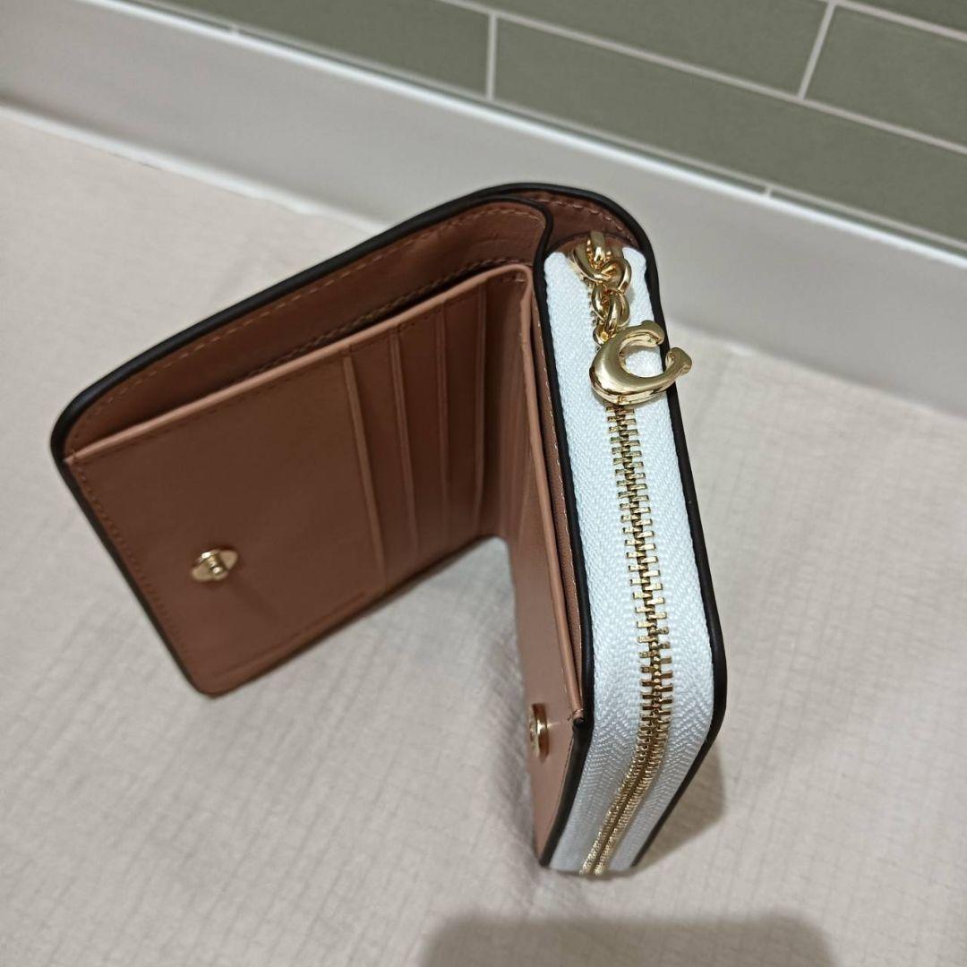 COACH　ビルフォードウォレット　スヌーピー サーフィンデザイン　ホワイト