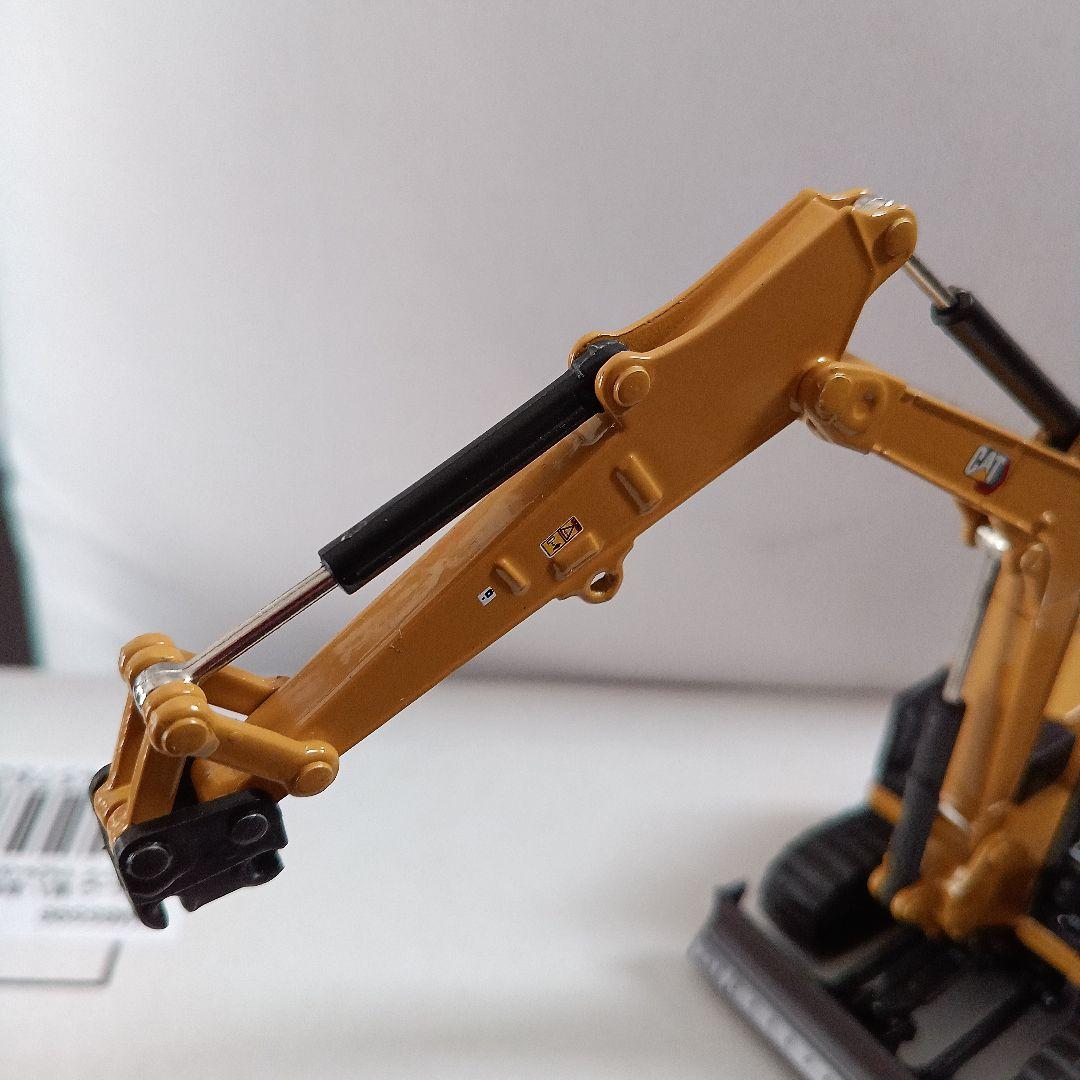 CAT308CR 1/50モデル（スチールケース入）おまけ付♪ Amazon | CAT Caterpillar 308 CR 次世代ミニ油圧ショベル 作業