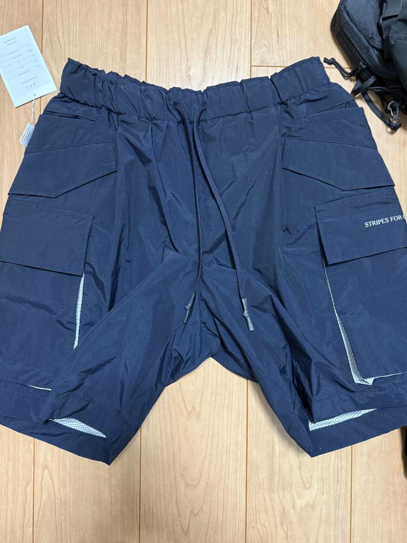 パンツ S.F.C WIDE CARGO SHORTS NAVY M