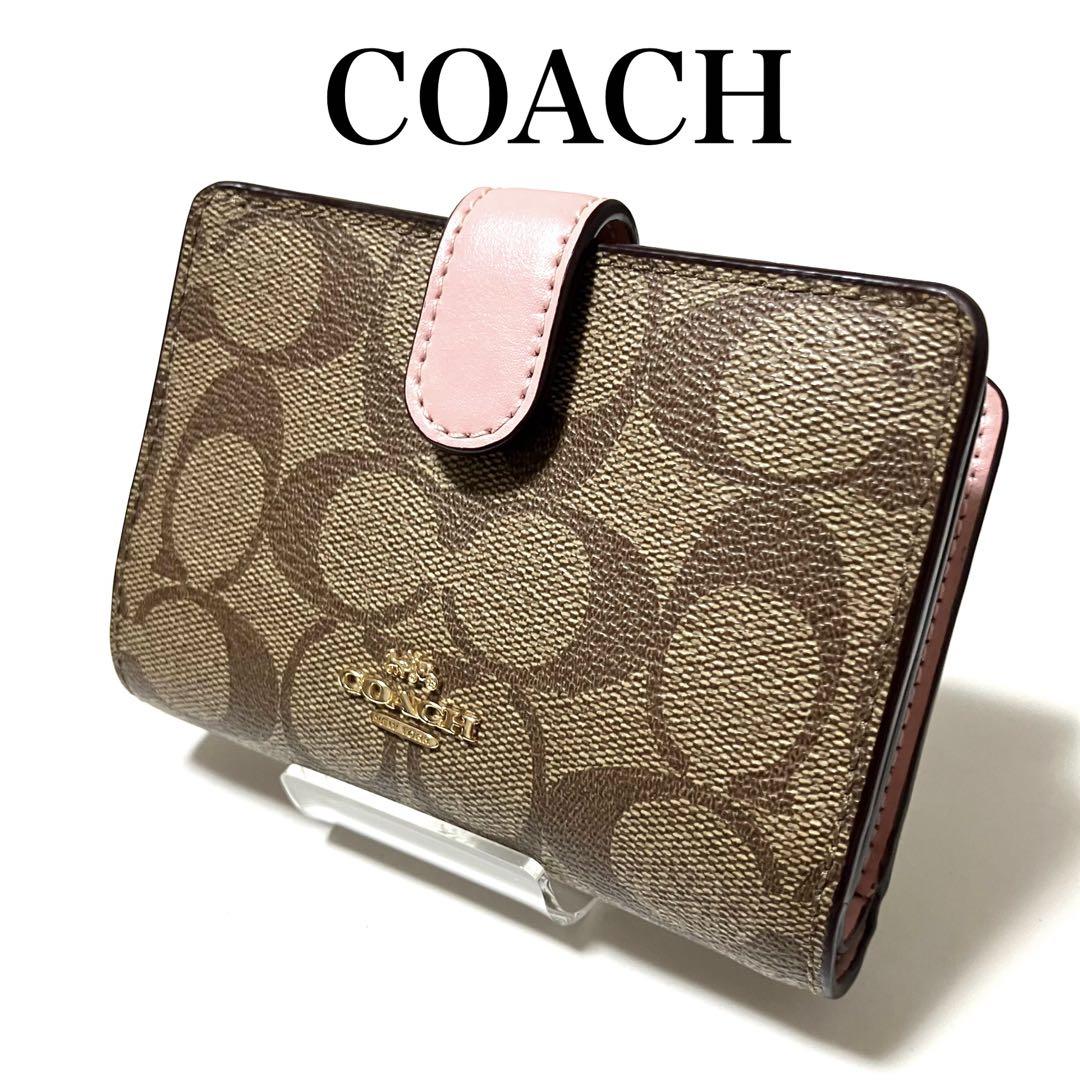 COACH コーチ 二つ折り財布 23553 シグネチャー 総柄 ピンク