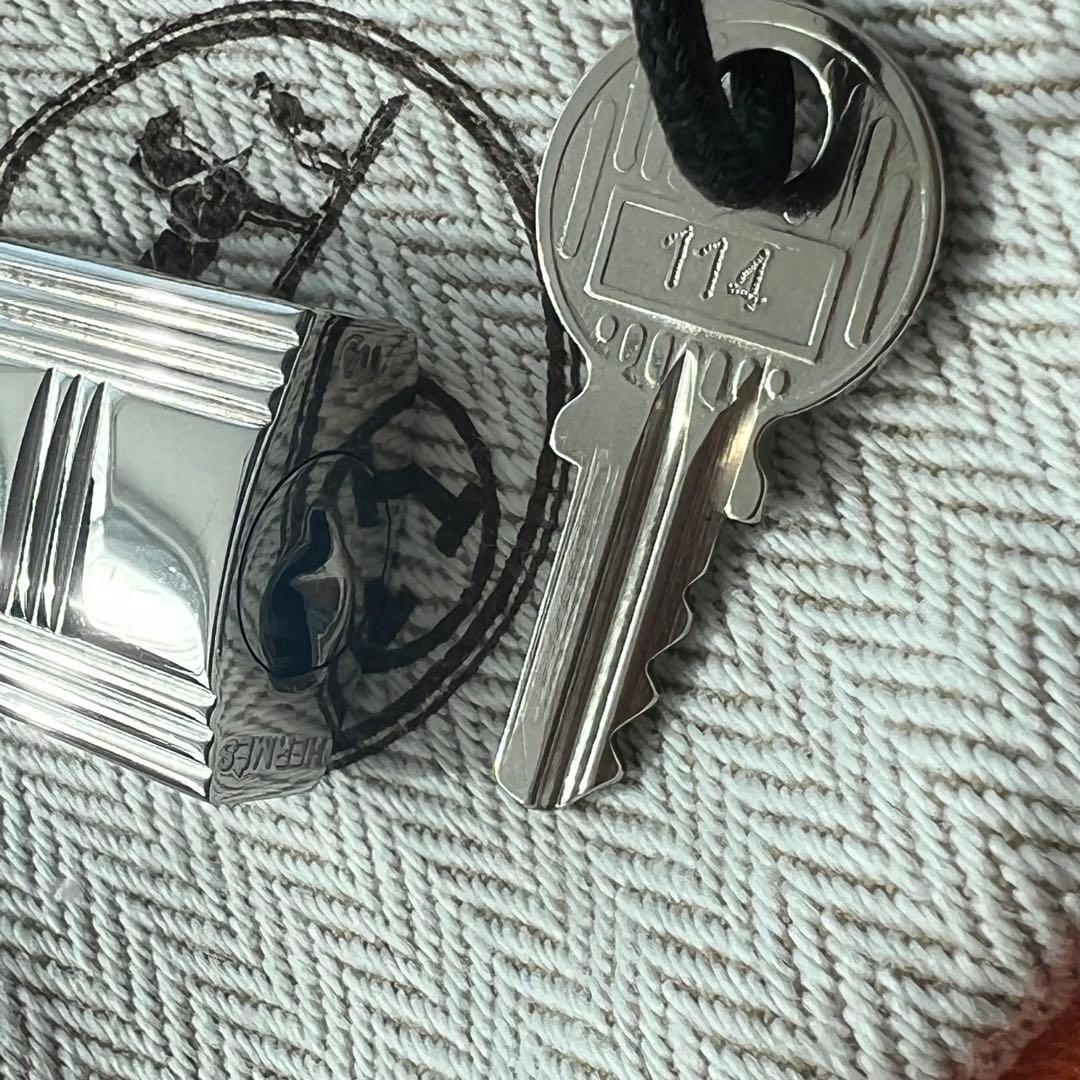 Hermèsエルメスエールラインリュックシルバーカデナ南京錠。鍵なし 2209271121.jpg