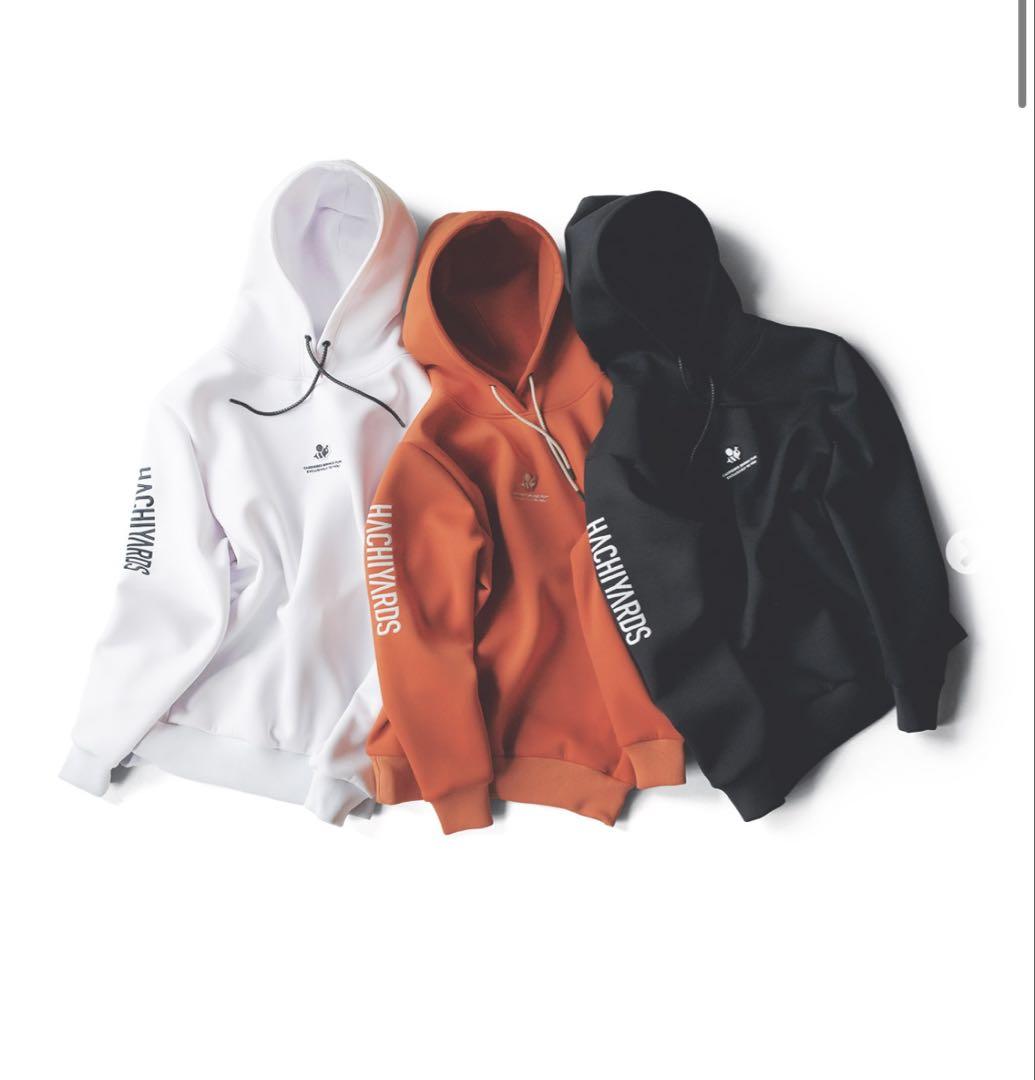 美品／フード付きスウェット オレンジ色