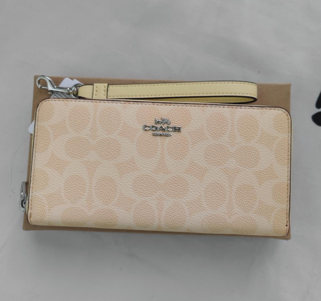 COACH 長財布 イエロー 未使用 - メルカリ