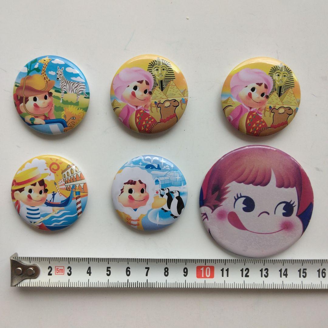 ペコちゃんの缶バッジ 6個セット 不二家 - メルカリ