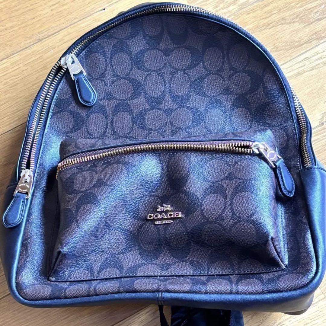 COACH】シグネチャー レザー リュック バッグパック - メルカリ