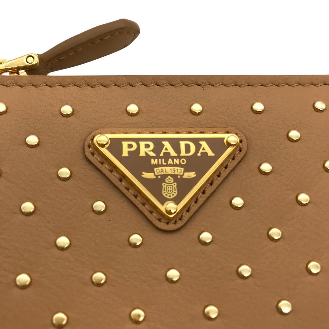 【現行/新品】PRADA プラダ コンパクト スタッズドレザー 二つ折り 財布 現行/新品】PRADA プラダ コンパクト スタッズドレザー 二つ折り