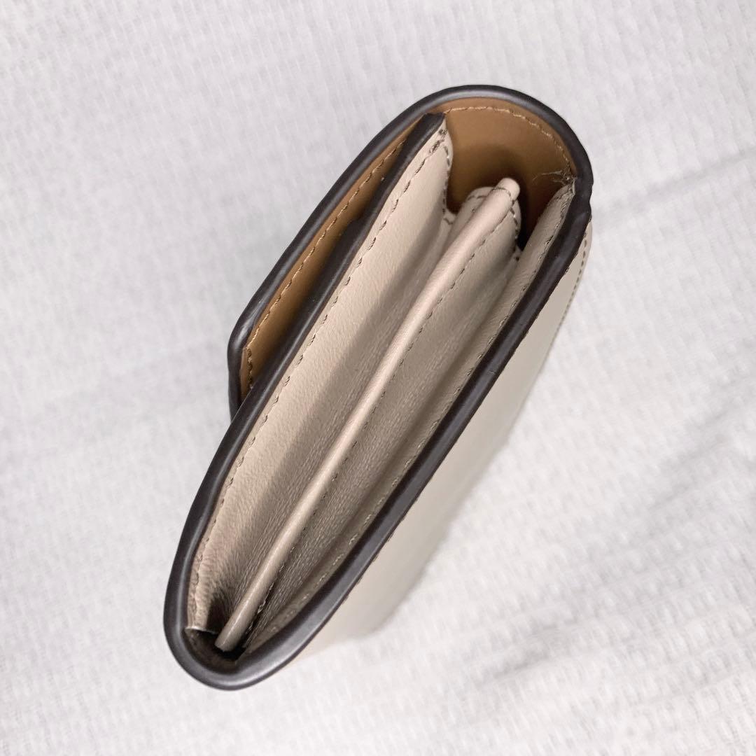 未使用級◎FURLA 長財布 プリムラ バイカラー カーキ アーチロゴ 金具