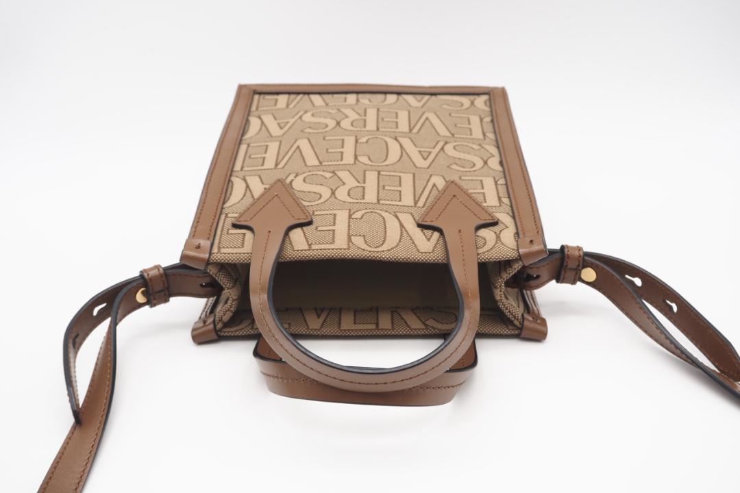 VERSACE 2WAYバッグ キャンバス VERSACE オールオーバー ロゴ