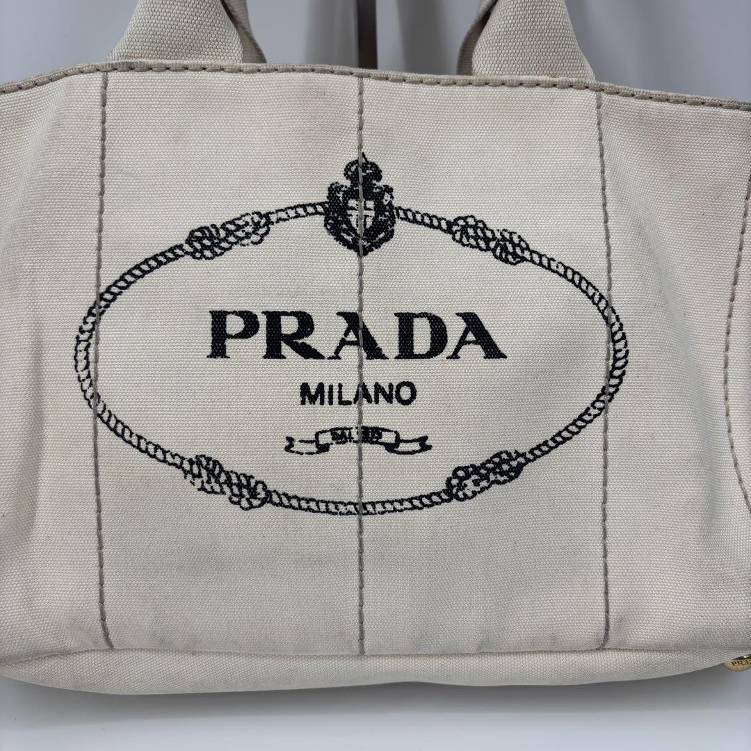 プラダ A4 白タグ トートバッグ ハンドバッグ 金枠ロゴ PRADA カナパ