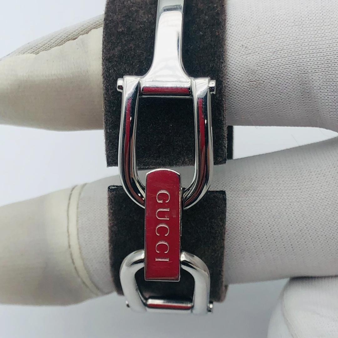 【稼働品】グッチ 1500L ピンクシェル文字盤 バングルウォッチ レディース