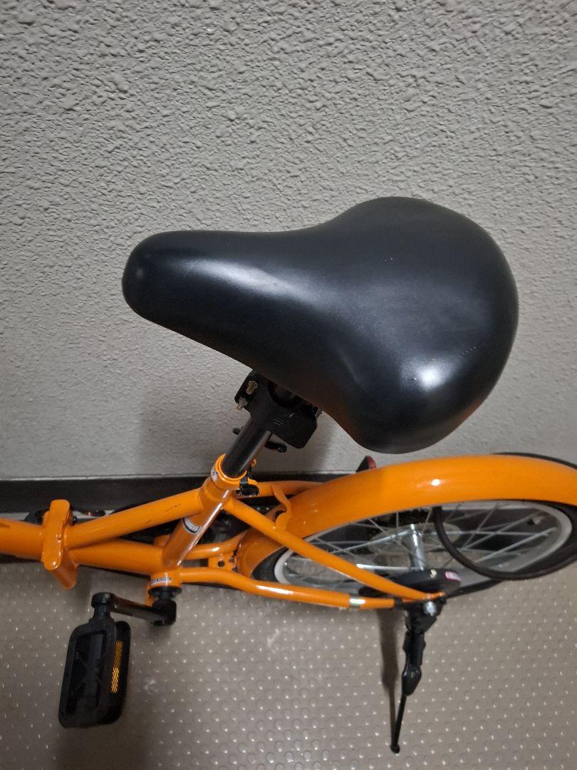 オレンジ 折りたたみ自転車 サイドスタンド付き