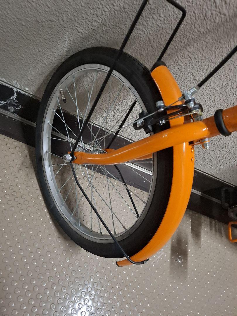 オレンジ 折りたたみ自転車 サイドスタンド付き