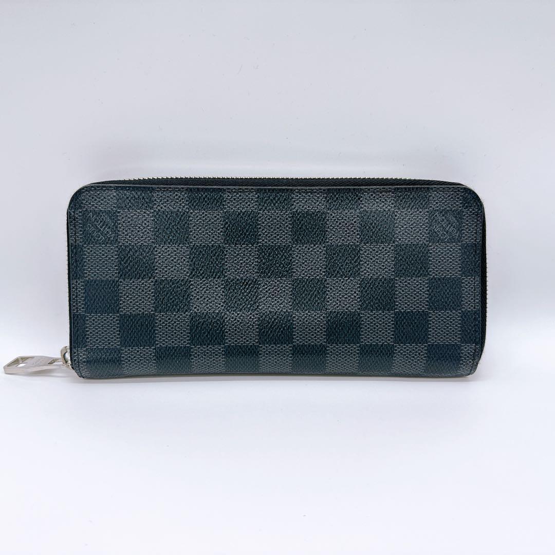 ルイヴィトン N63095 ダミエグラフィット ヴェルティカル ラウンドファスナ ルイヴィトン N63095 ダミエグラフィット ヴェルティカル ラウンドファスナ