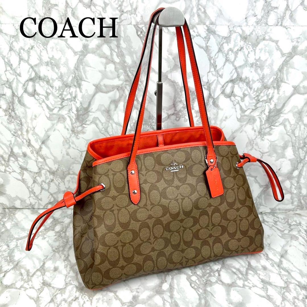価格は安く COACH コーチ ハンドバッグ シグネチャー オレンジ - メルカリ バッグ