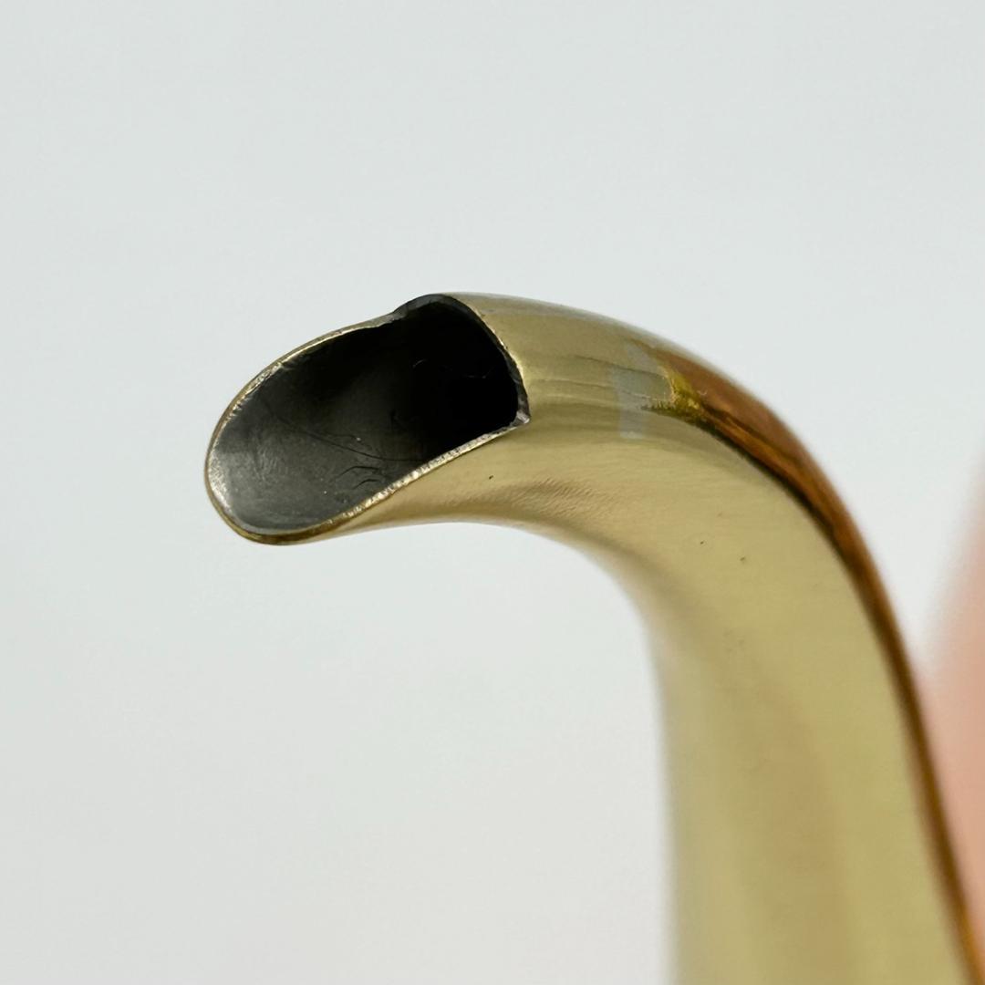 Cu