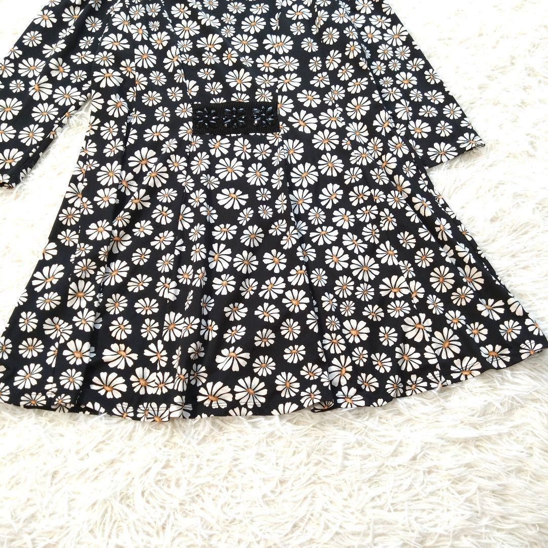 【美品】黒いフリル袖チュニック 香水瓶　花柄プリント　スーパービューティー 美品】黒いフリル袖チュニック 香水瓶 花柄プリント スーパー