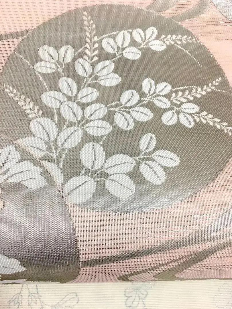 夏着物 夏帯 麗し美品 濁りない綺麗な薄桃色 銀糸 流水 丸文様 四季の花々 美品夏帯 麗しく濁りない薄桃色 フォーマル感 銀糸 流水 丸文様