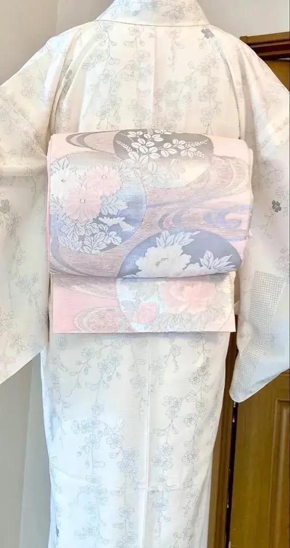 夏着物 夏帯 麗し美品 濁りない綺麗な薄桃色 銀糸 流水 丸文様 四季の花々 美品夏帯 麗しく濁りない薄桃色 フォーマル感 銀糸 流水 丸文様