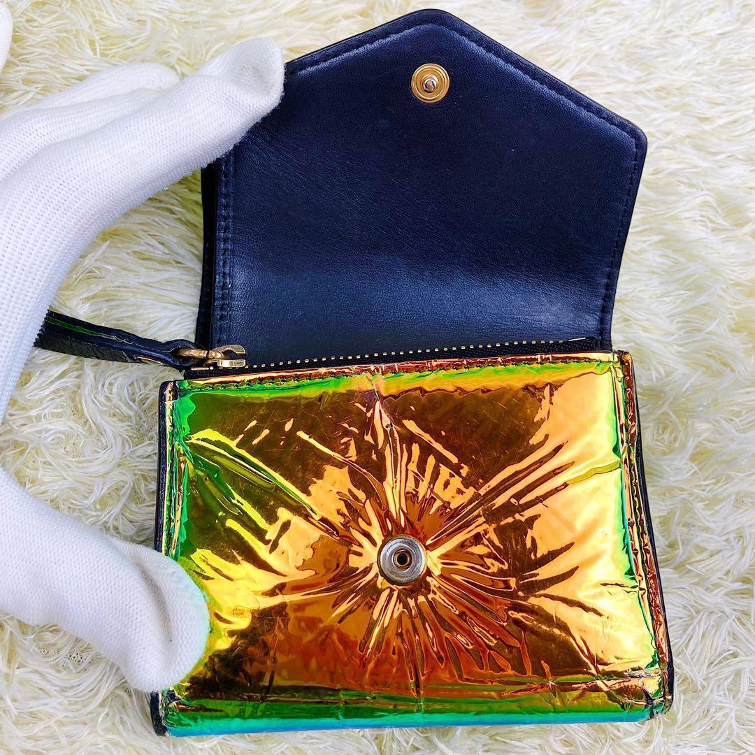 幻の逸品⭐️メゾンマルジェラ エンベロープ 4つタグ 折り財布 玉虫色 レザー by メルカリ