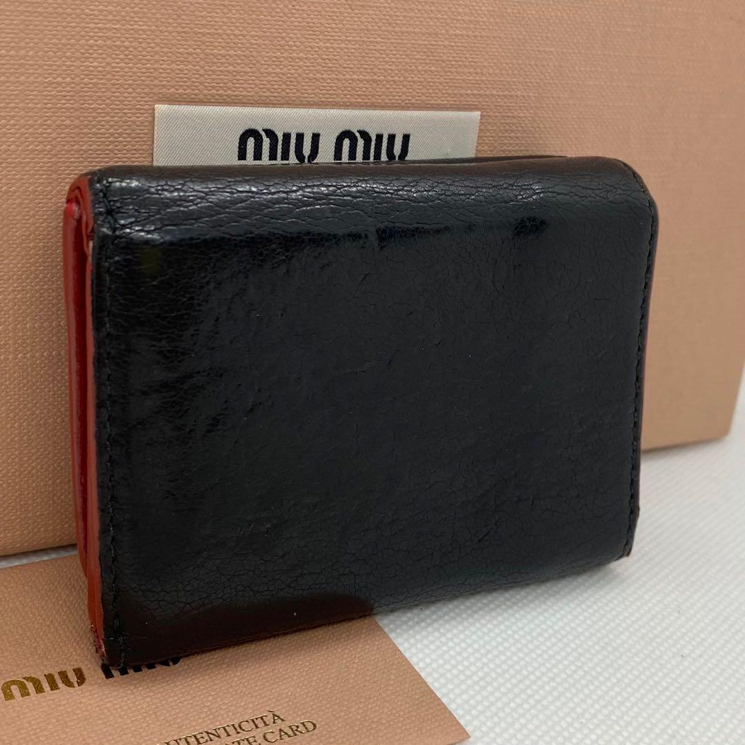 【美品 箱付き】ミュウミュウ 三つ折り ブラック マドラス ハート レザー 黒 美品 箱付き】ミュウミュウ 三つ折り ブラック マドラス ハート
