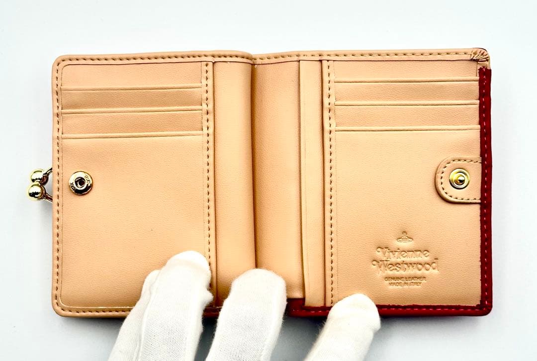 ♡新品未使用♡】Vivienne Westwood 二つ折り財布 ピーチ 人気 - メルカリ