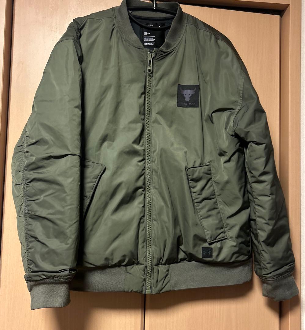 【希少】23AWアンダーアーマー プロジェクトロック ボンバージャケット LG
