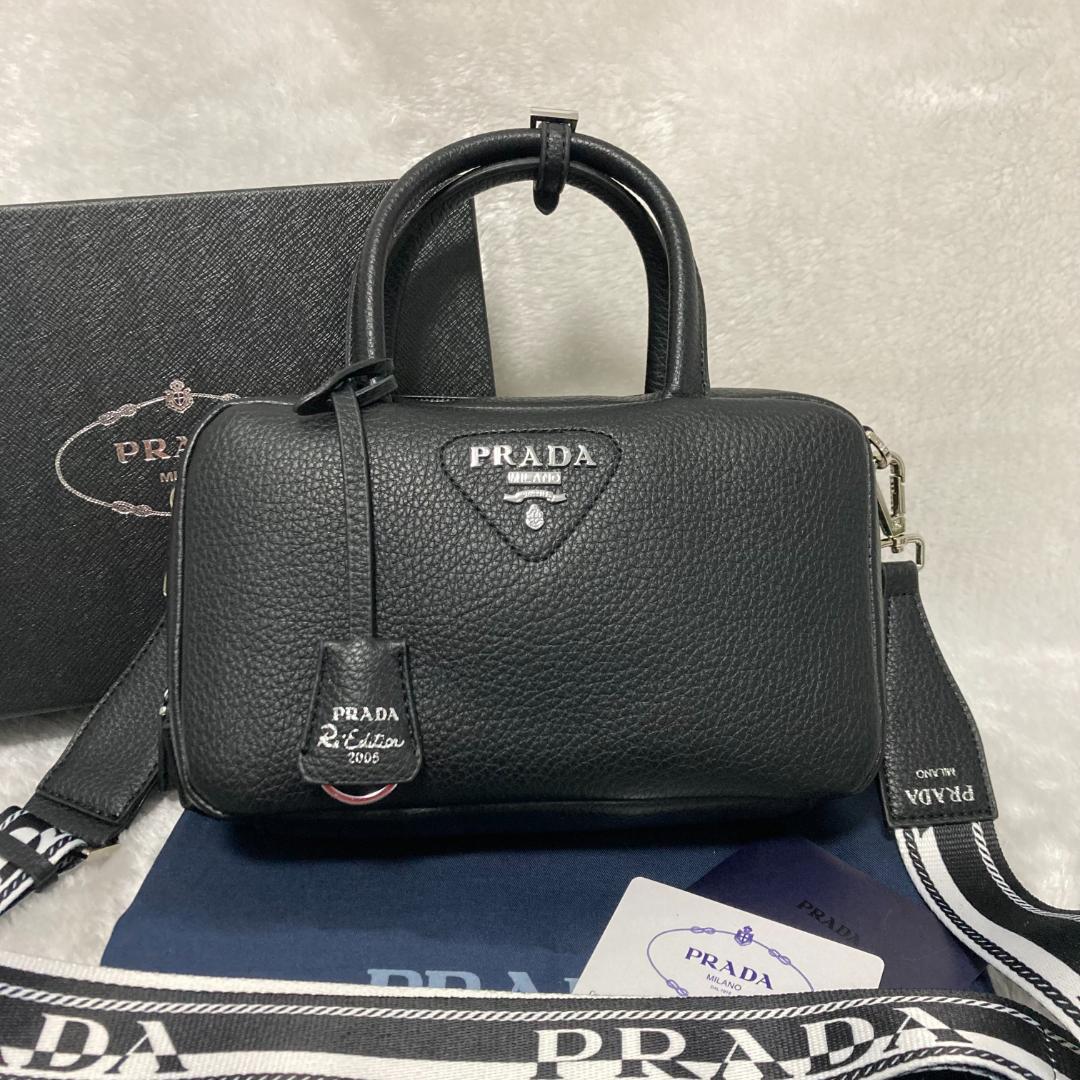 【PRADA】ブラックレザーハンドバッグ PRADA ブラックレザー ハンドバッグ - メルカリ