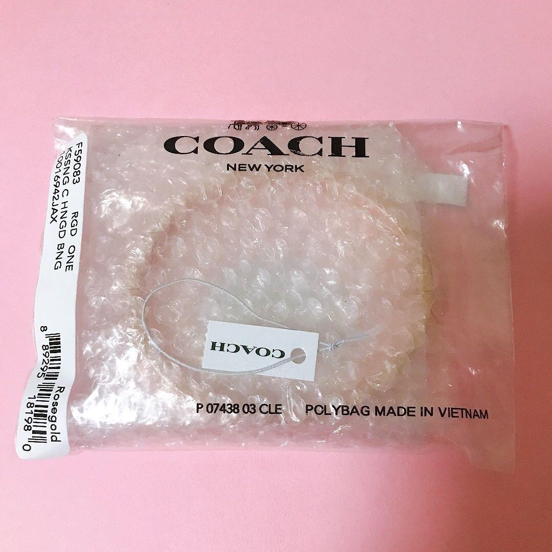 COACH　シグネチャー　ヒンジド　バングル　ローズゴールド