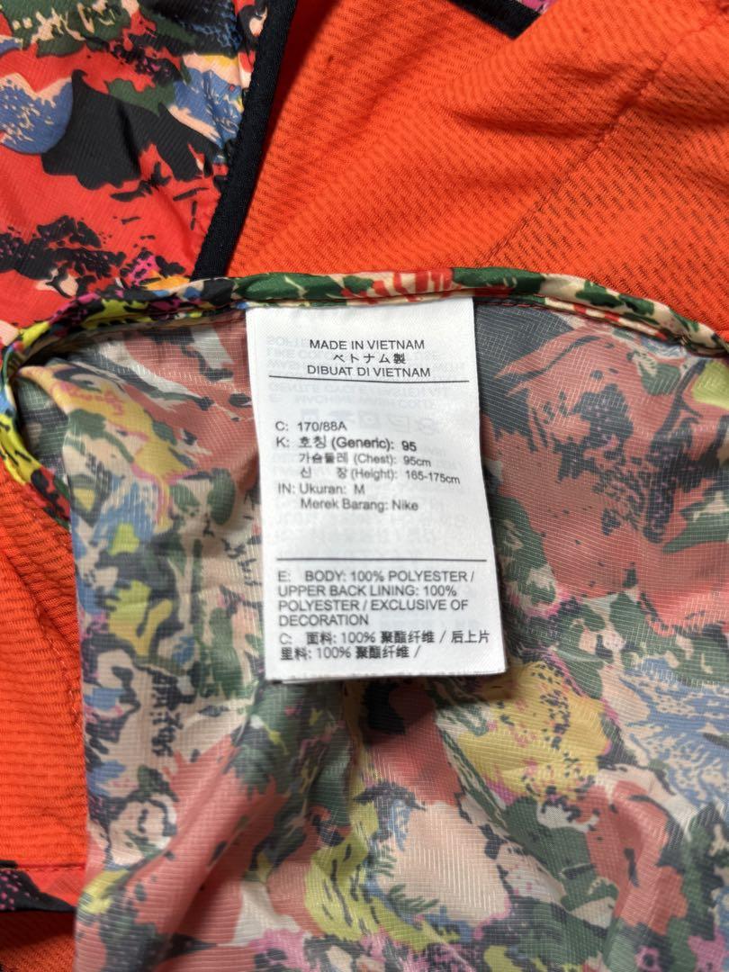 【希少品】美品✨NIKE ウィンドランナー　花柄　ランニングウェア　twice