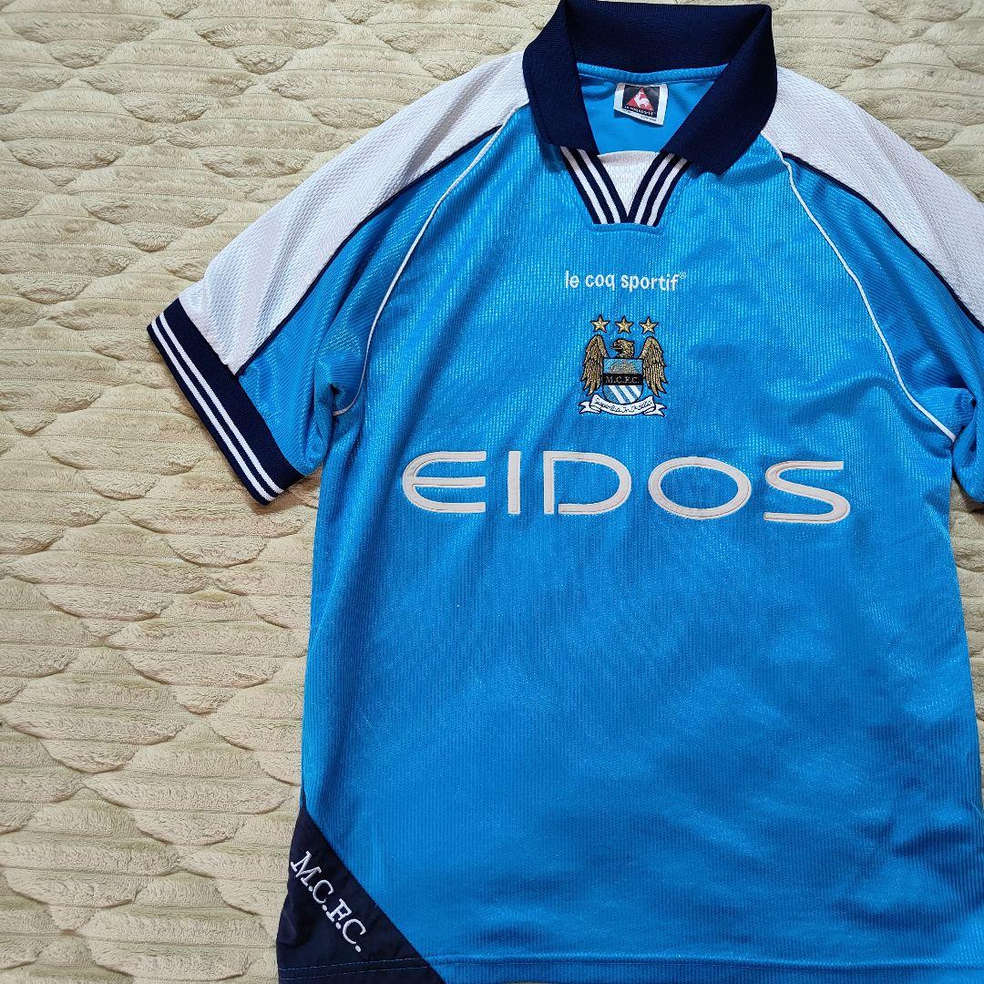 国内外の人気 ルコック ユニホーム Manchester City Home 99/00 - メルカリ ウェア