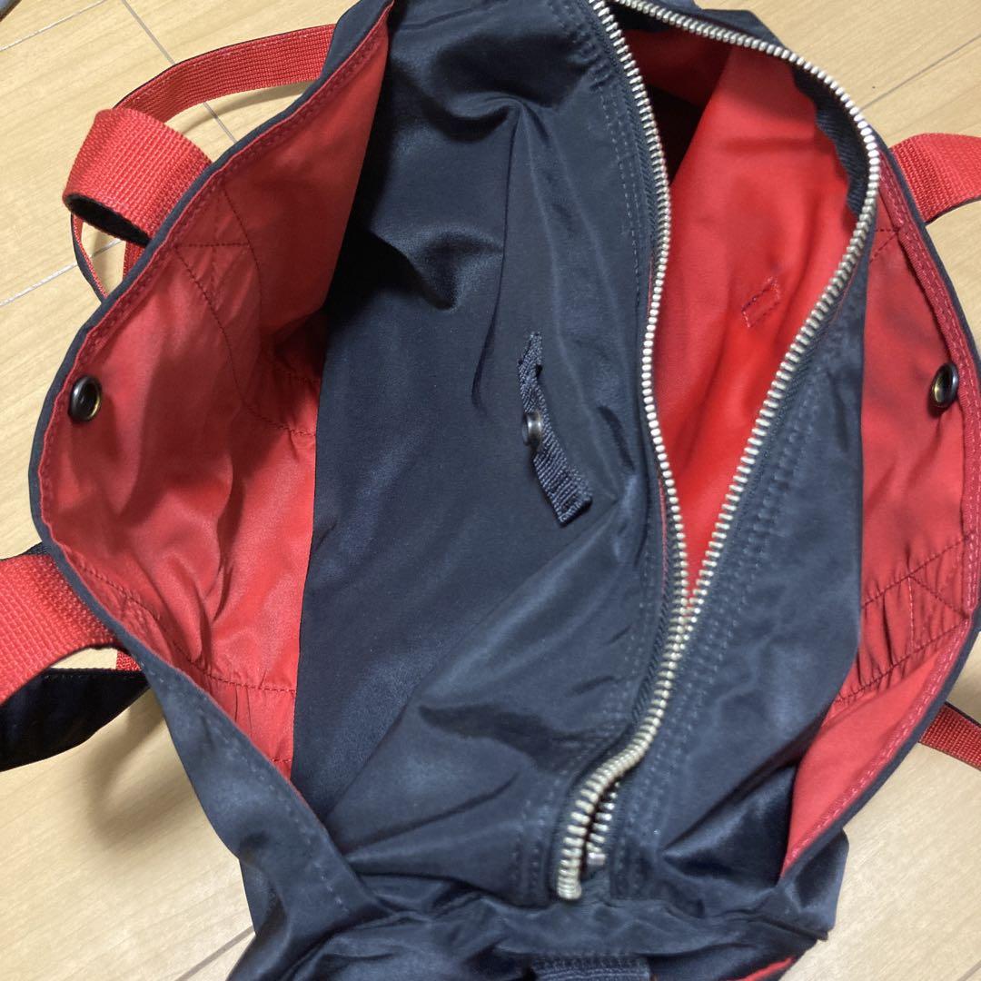 との出品