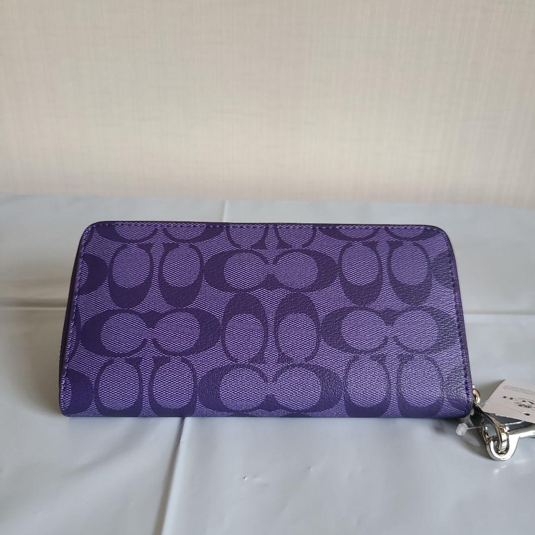 COACH ラウンドファスナー 長財布 シグネチャーキャンバス パープル