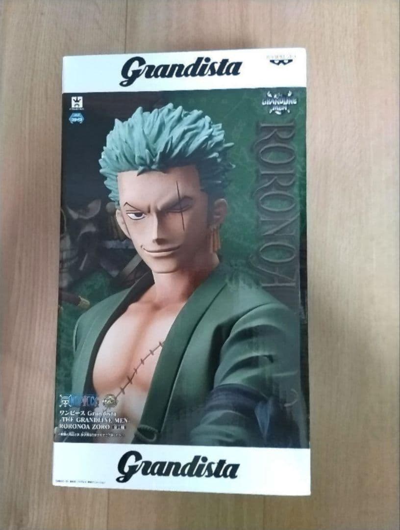 ワンピース ゾロ フィギュア&着るフリース&ゾロ マグネット&非売品零巻セット ワンピース ゾロ フィギュア&着るフリース&ゾロ マグネット&非売品零巻セット